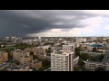 Stormy sky over one part of london while there are no clouds of another part