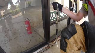 Storefront door removal from pin hinge