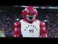 Inflatable raptor and his inflatable friends dance (Toronto)