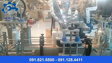 Dây chuyền chiết chai- Máy chiết rót- Quy trình cấp nắp, siu màng nhôm chai tự động