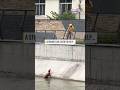 Chinese delivery guy saves stranded dog from drowning