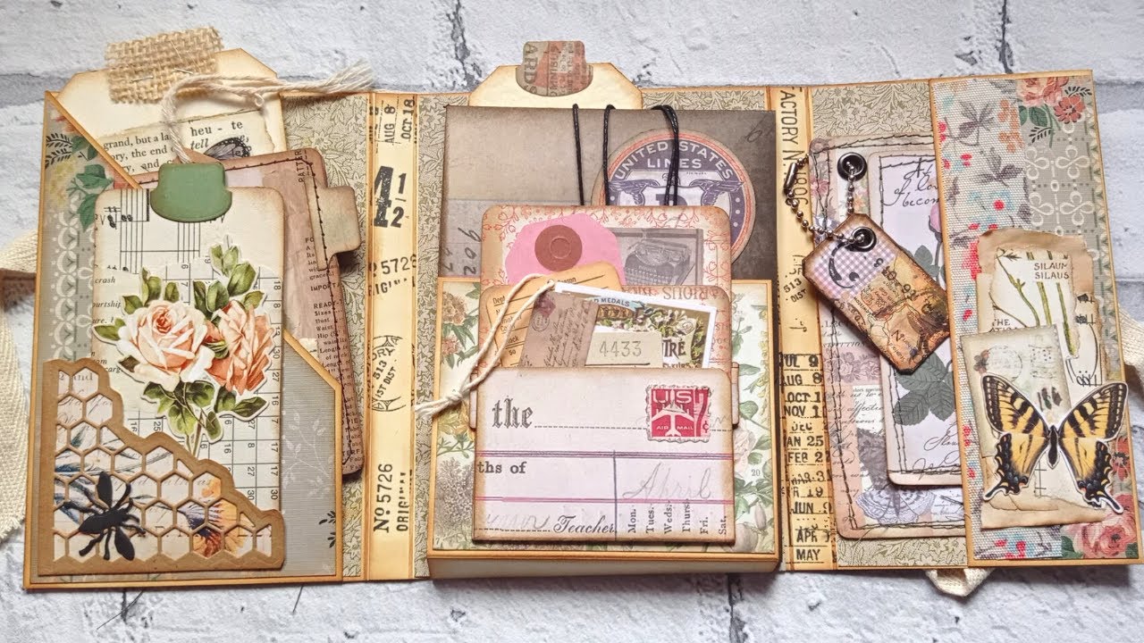 Decorating The Tim Holtz Accordion Folio - YouTube