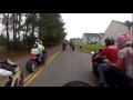 Girl falls off MOTOR-CYCLE and gets stuck on tire