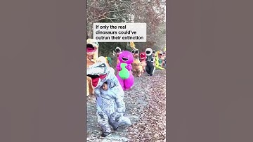 Runners participate in hilarious annual T-Rex costume race