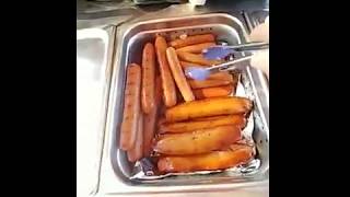 Hot dog vendor explains his cart and setup