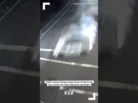 Traffic camera footage shows driver of sports car lose control and crash, killing her passenger