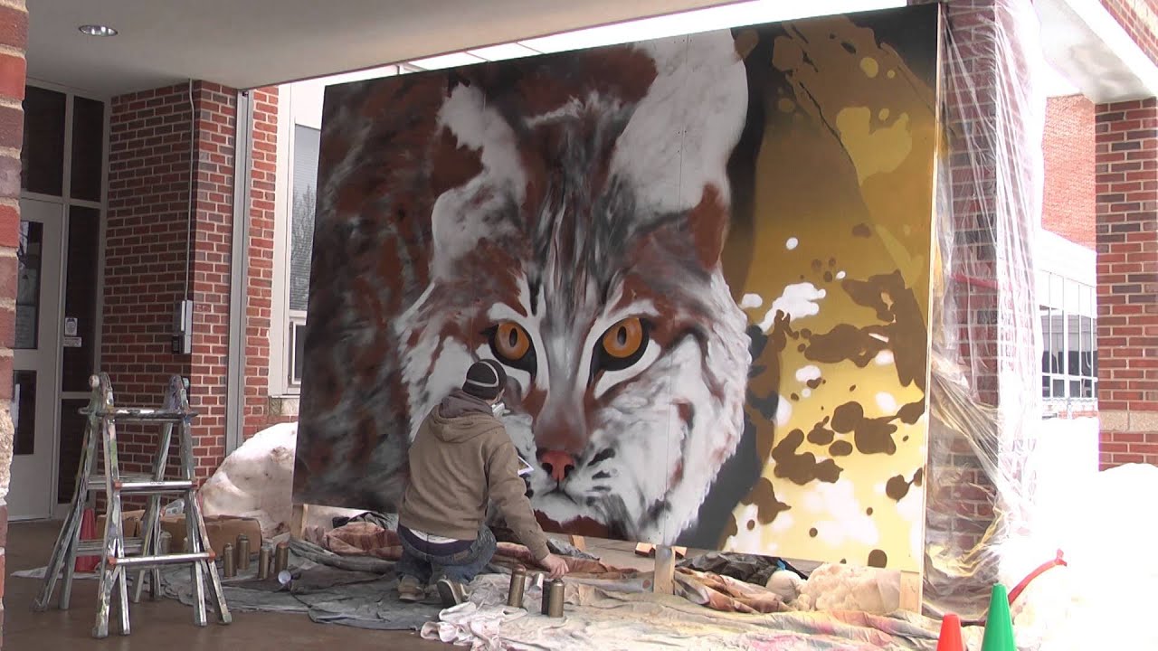 Timelapse of Wallingford graffiti artist creating a life-like mural