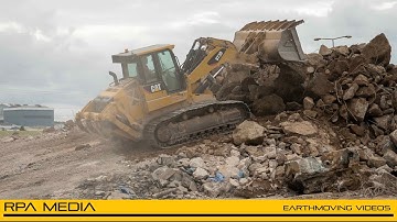 CAT 973D track loader handling crushed material