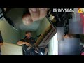 Bodycam: Suspect Fires Shot At Officer Breaching Apartment Door.