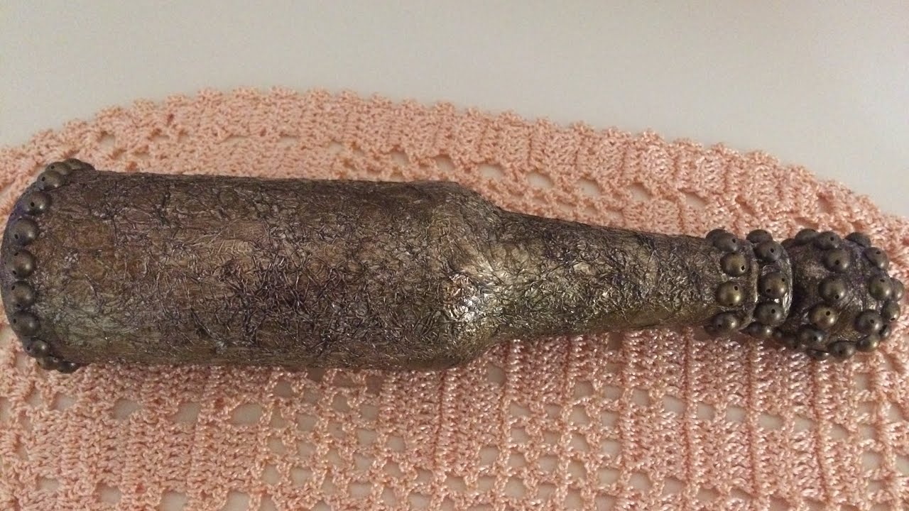 Garrafa luxuosa decorada com papel alumínio