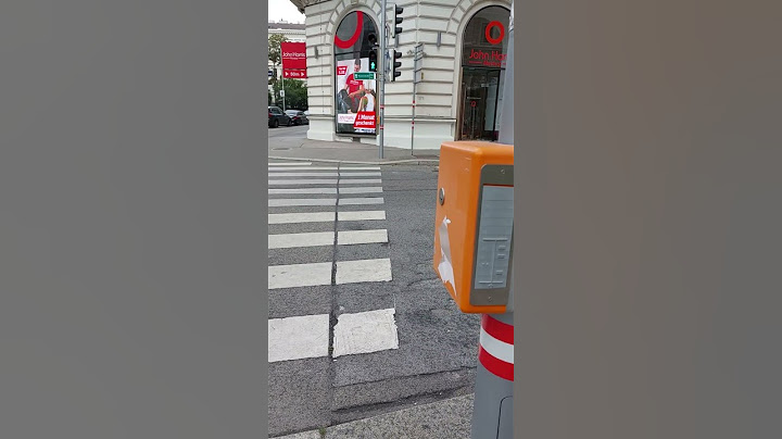 Vienna, Austria - Pedestrian crossing traffic light beeping sound.