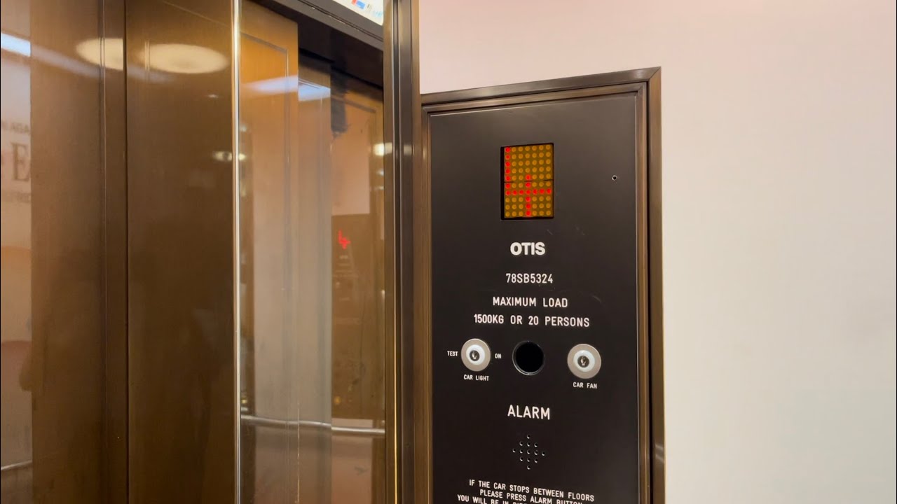 1980s OTIS lift at Selfridges, London, UK