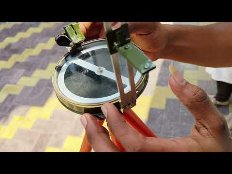 setting up of a prismatic compass