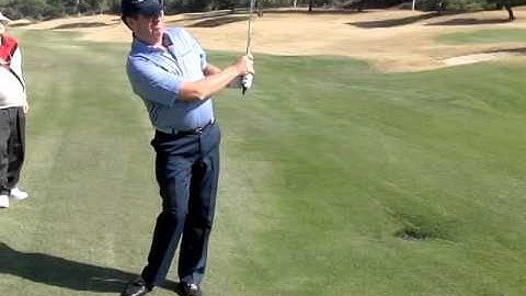 Phil Rodgers showing Pitching Technique to Steve Elkington