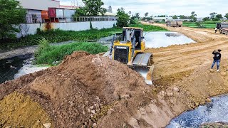 Unstoppable Power SHANTUI DH17C2 Dozer Mastering New Road Construction with Dump Trucks