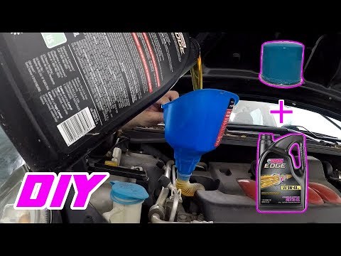 Vídeo: Como você inicia um botão de pressão em um Nissan Sentra?