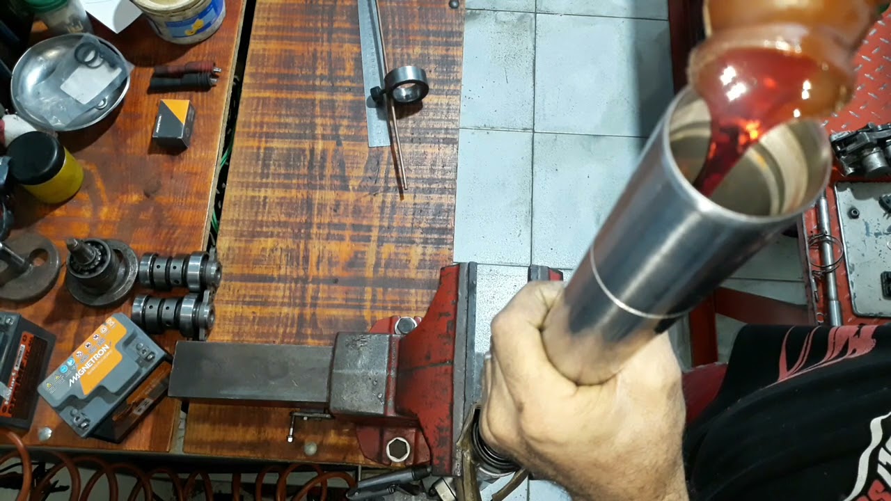 Nível do óleo da suspensão da XR 250 2008 TORNADO