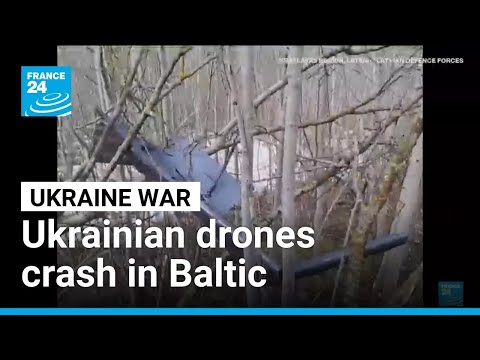 France 24 English segment titled Ukrainian drones crash in Baltic, over footage of drone wreckage among trees.