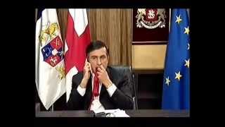 Саакашвили,чавкая, ест галстук. Saakashvili eating his tie.