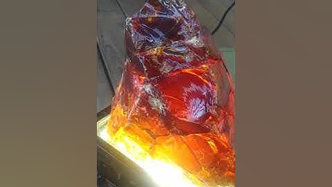 Sculpting with Ancient Amber tree sap by artist Randy Rhodes.