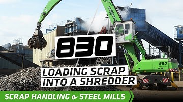 SENNEBOGEN - Scrap Handling: 830 Mobile Material Handler loading scrap into shredder at SIMS, UK