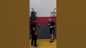 LEARN THE LEAPING LEFT HOOK #shorts
