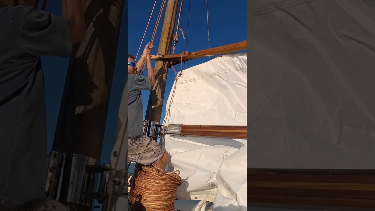 ⁣Installing brand new gaff sails on a 90ft wooden schooner — Sailing Yabá #shorts #woodenboats