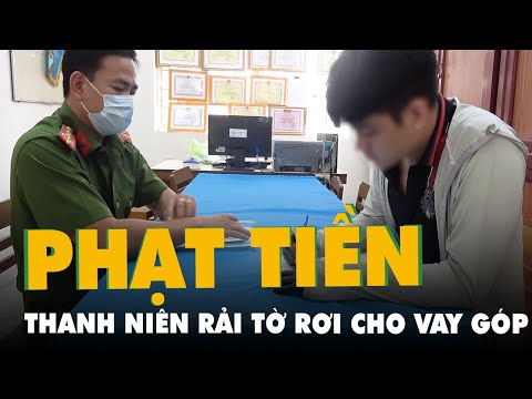 Video Rải tờ rơi quảng cáo cho vay tiền góp, nam thanh niên... - youtube