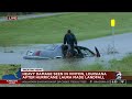 Man spotted on top of flooded vehicle in Vinton, Louisiana