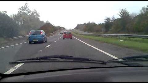 Corsa red top taking it for a blast.