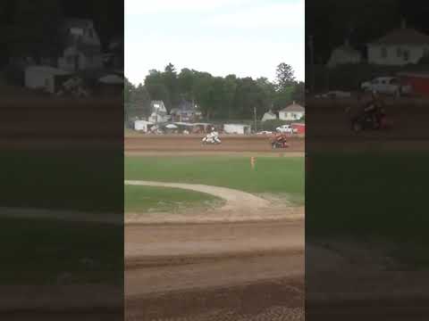 John Fahl rolls his 410 sprint backward over the tire marker at Plymouth Dirt Track.