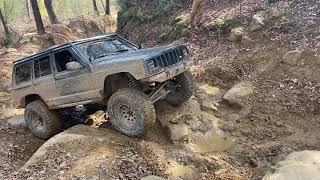 Jeep Cherokee XJ on a Wet Trail 16 at Windrock Park