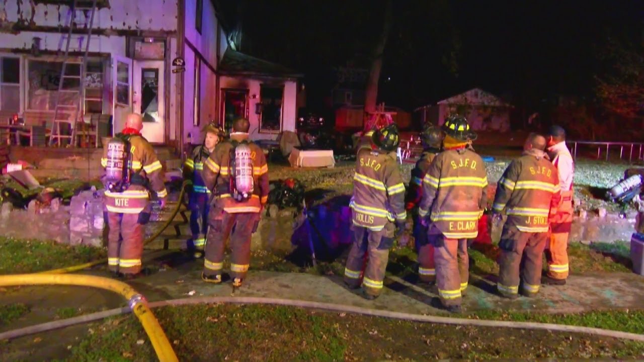 Multiple people rescued from overnight house fire - YouTube