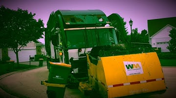 2 Waste Management Front Loaders With Curotto Cans
