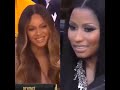 beyonce and nicki minaj looking at each other and smiling