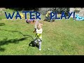 Fun Water play! Harrison waters plants and gets crazy with the hose!  Kids and hoses and water!