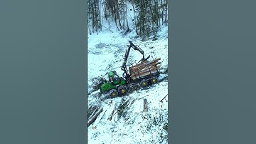 Timber Takedown: John Deere 1910G in Action