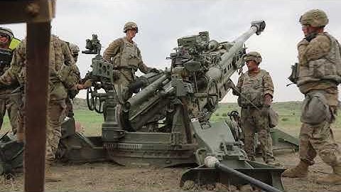 2nd Stryker Brigade Combat Team, 4th Infantry Division, fires an M777 Howitzer for table qualificat