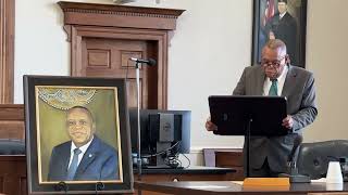 Retired Calhoun County Clerk of Court Kenneth Hasty talks after his portrait is unveiled at the