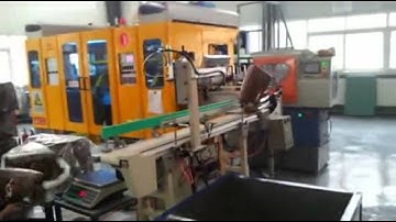 Shell - Oil Bottle Machine 4 + 4 with Robot Takeout