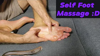 Self-foot massage with Gua Sha tool