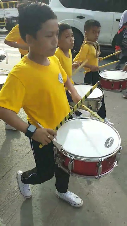 DRUM MAKE A SOUND IN PARADE OF DRUM AND LYR CORPS