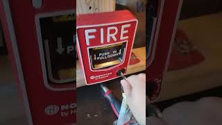 Pulling and resetting a Notifier NBG-12L pull station