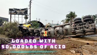 Car crash causes a tanker loaded with acid to fly off the freeway