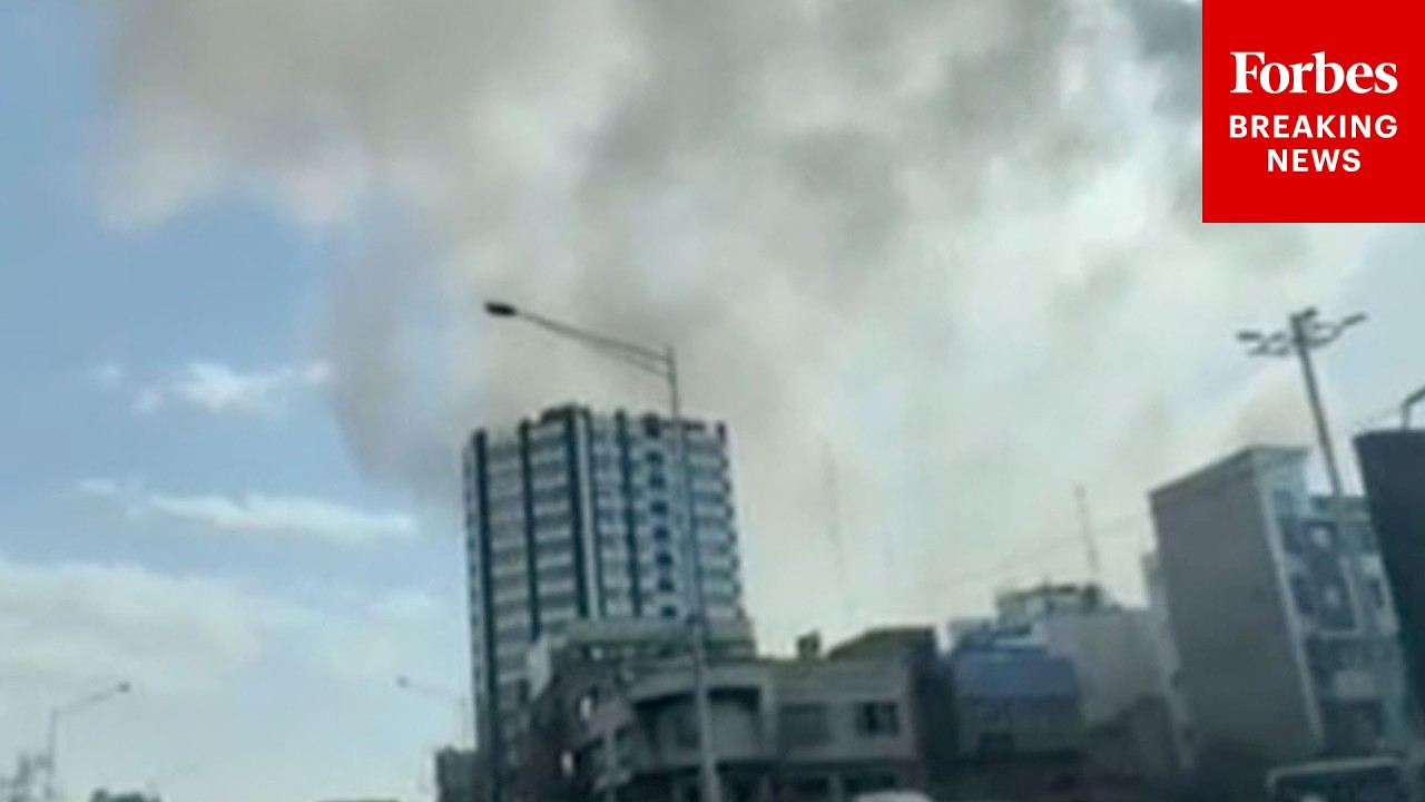 RAW VIDEO: Smoke Rises In Tehran, Iran, After U.S.-Israel Coordinated Strikes