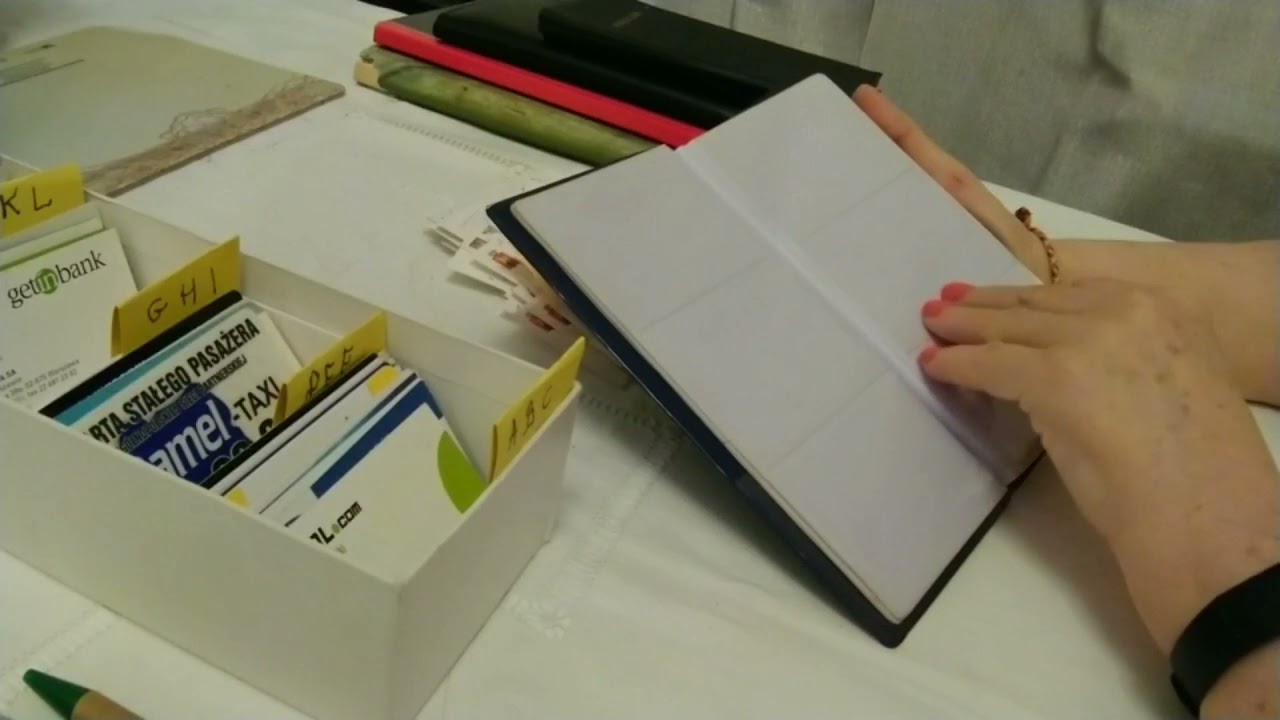 ASMR /Sorting business cards.  Rustling, other sounds.  Quiet speech/