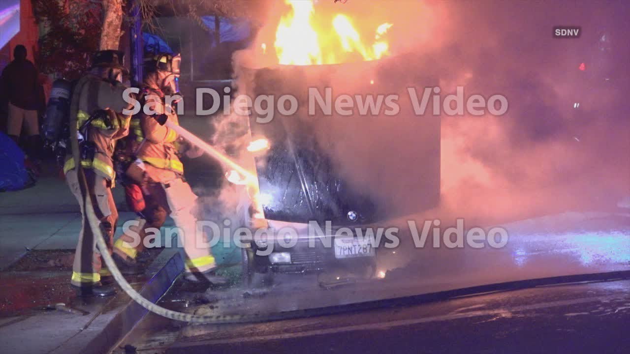 San Diego Police Officers rescue sleeping man from burning car in East ...