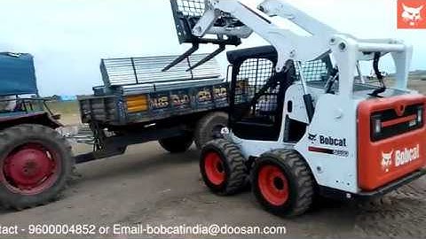 Bobcat SSL with Pallet fork attachment