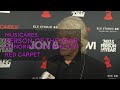 Watch Jon Bon Jovi, Jim Gaffigan &amp; Jellyroll Walk The 2024 MusiCares Person Of The Year Red Carpet