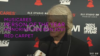 Watch Jon Bon Jovi, Jim Gaffigan \& Jellyroll Walk The 2024 MusiCares Person Of The Year Red Carpet